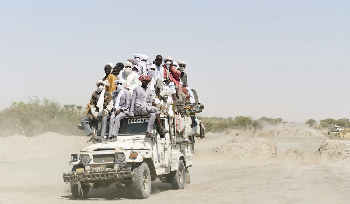 Chadian people carried across the desert on the way to Bol, in southern Chad on November 9, 2018.